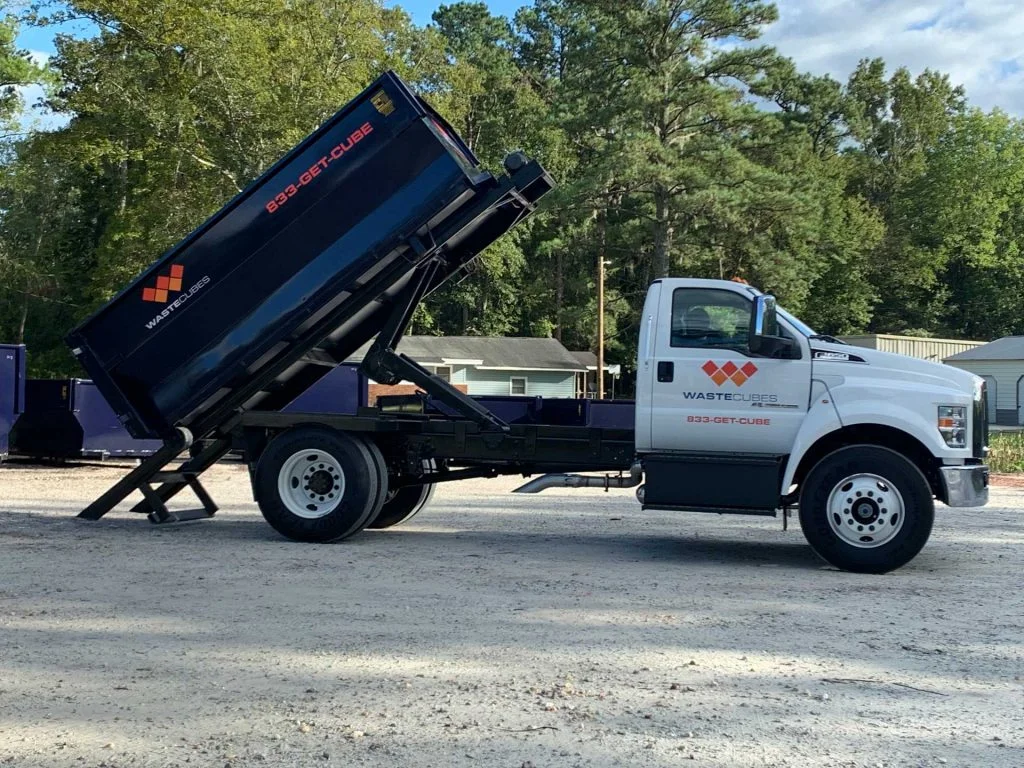 waste cubes truck and dumpster