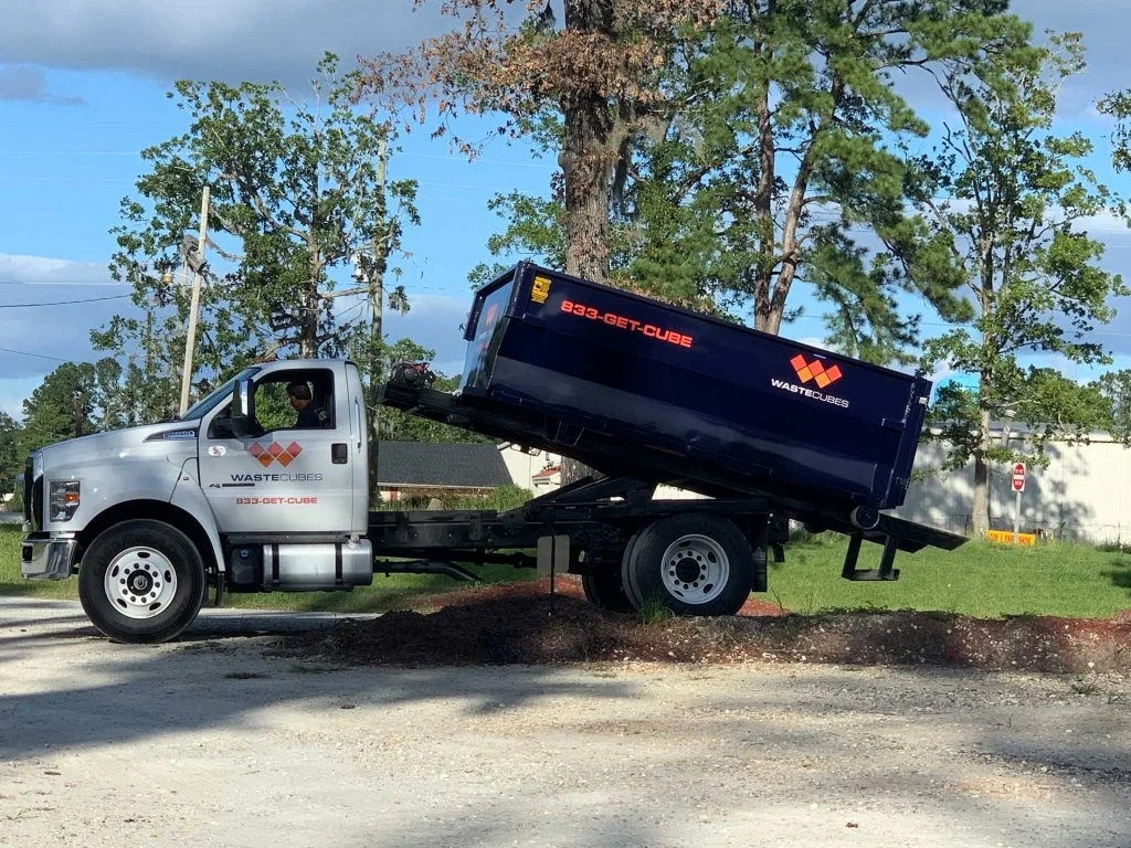 waste cubes truck container lifted