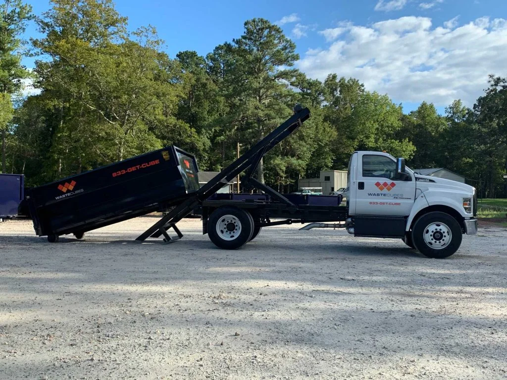 waste cubes truck unloading